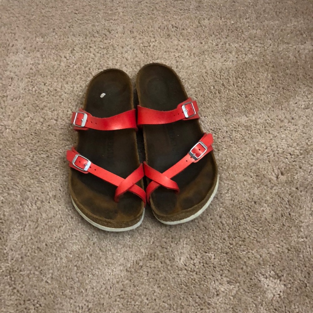 Red Birkenstock’s with toe strap sz40